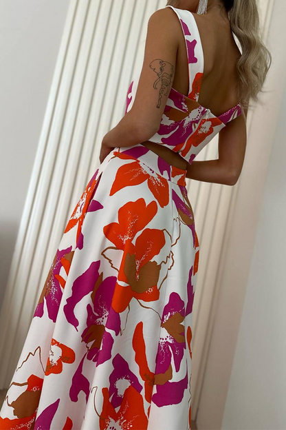 Elegante conjunto de dos piezas sin mangas con cuello cuadrado y bolsillo con estampado floral