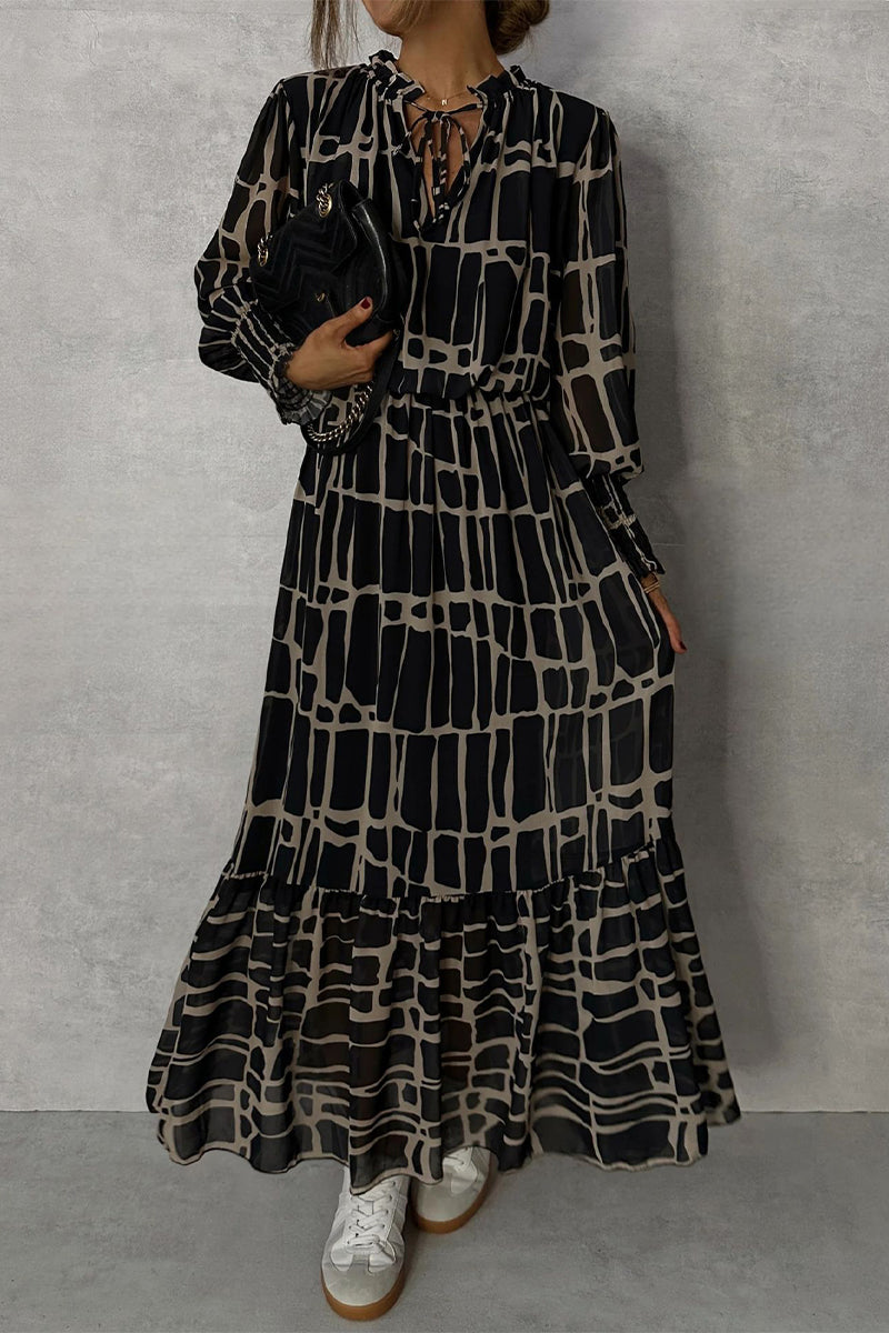 Elegante vestido de corte A con cuello redondo, encaje y estampado geométrico