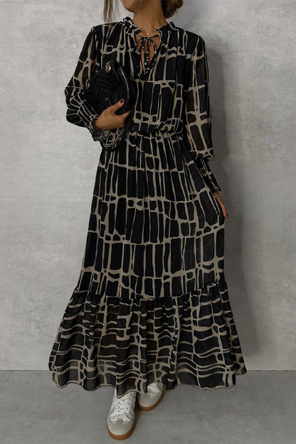 Elegante vestido de corte A con cuello redondo, encaje y estampado geométrico