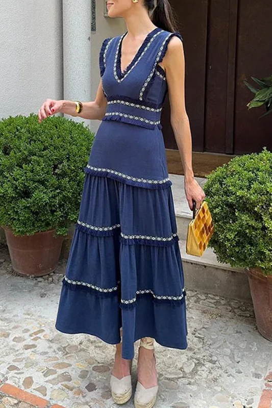 Elegante vestido de color liso con flecos y cuello en V sin mangas