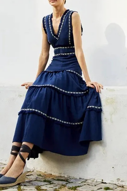 Elegante vestido de color liso con flecos y cuello en V sin mangas