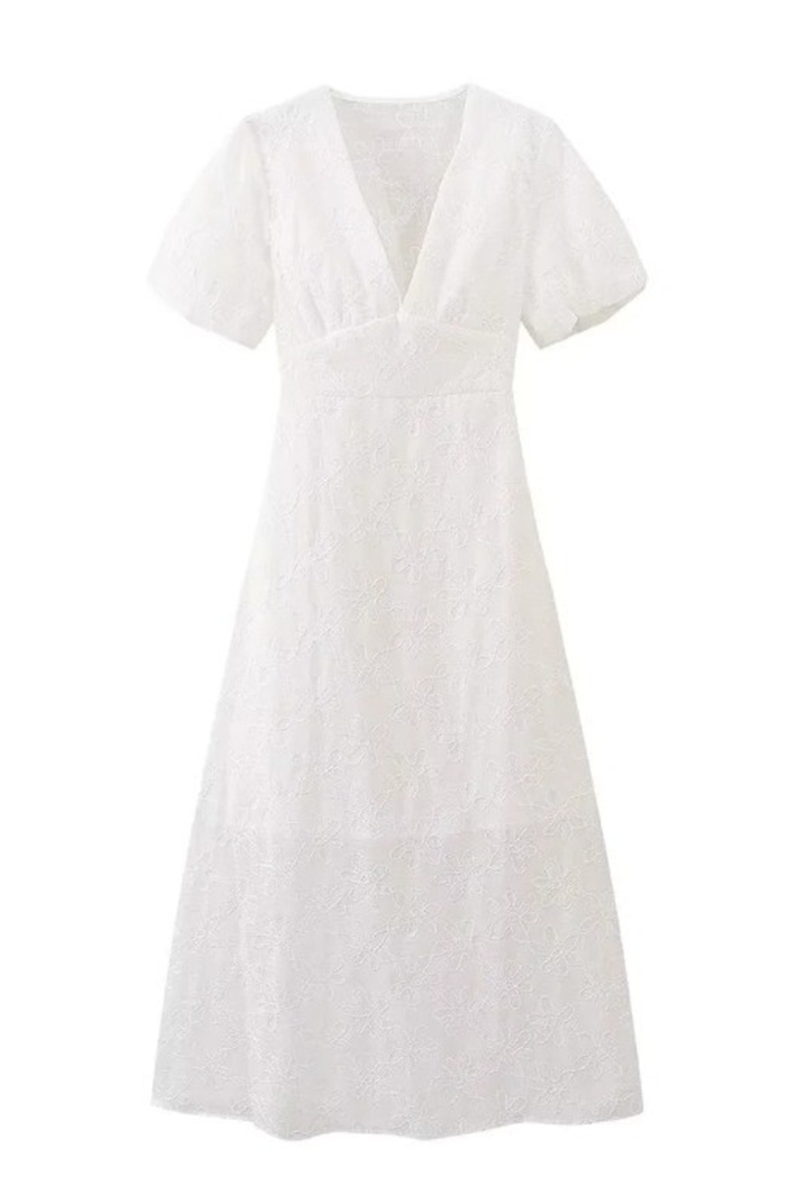 Elegante vestido de manga corta con escote en V y bordado en color liso