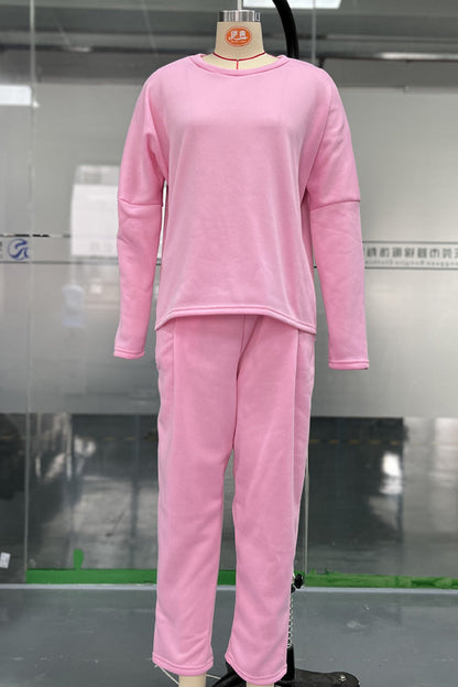 Conjunto informal de dos piezas con cuello redondo, manga larga y bolsillos en color liso (9 colores)