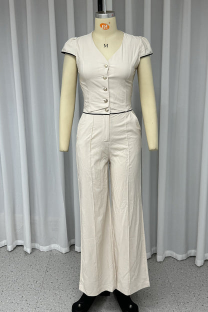 Conjunto informal de dos piezas con cuello en V, manga corta, bolsillos, botones y color liso