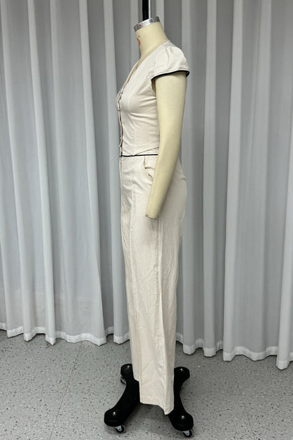 Conjunto informal de dos piezas con cuello en V, manga corta, bolsillos, botones y color liso