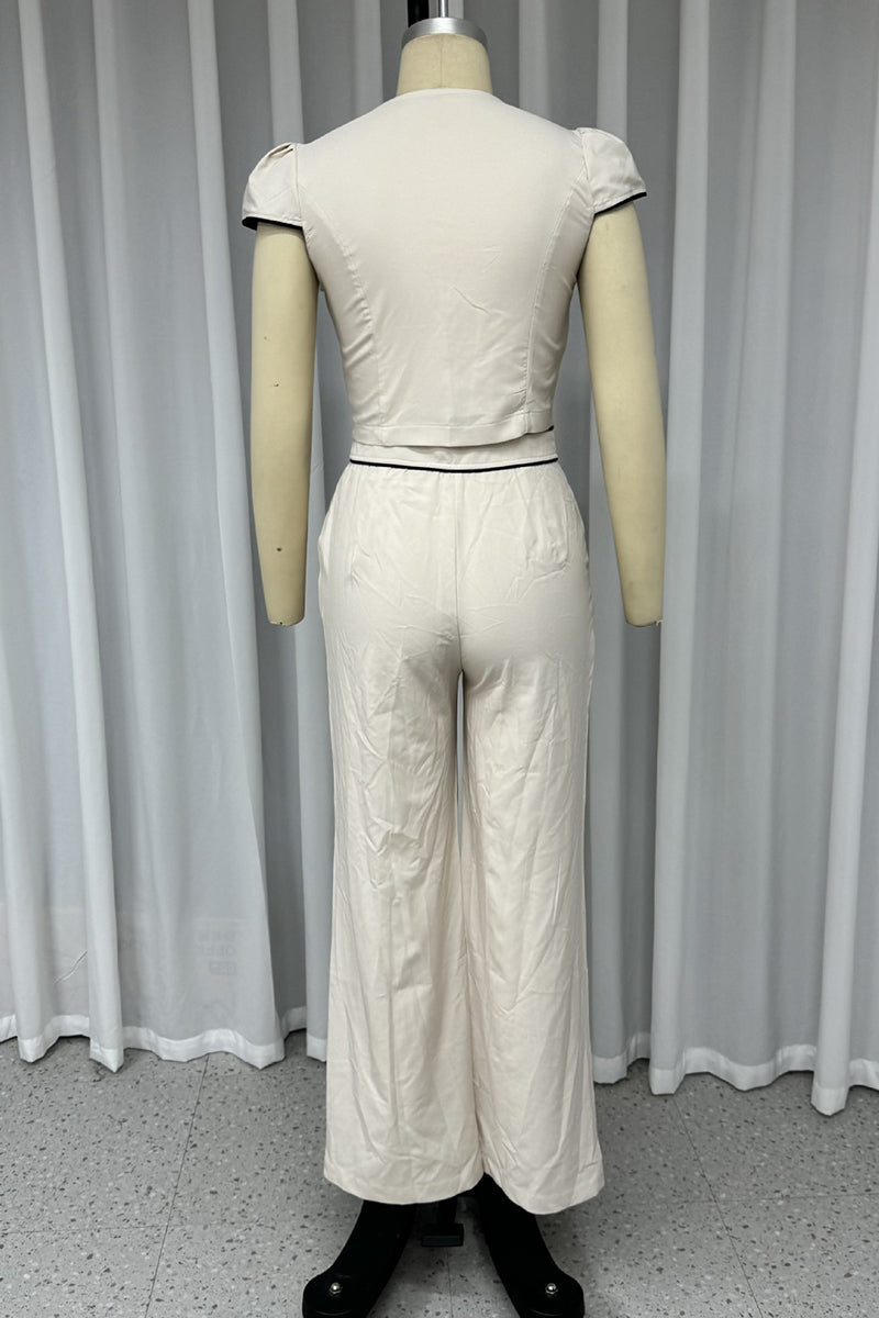 Conjunto informal de dos piezas con cuello en V, manga corta, bolsillos, botones y color liso
