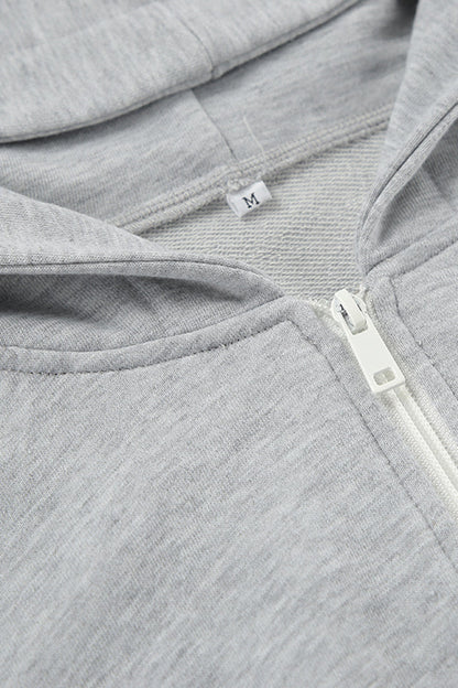 Ropa deportiva informal de color sólido con cremallera y capucha de manga larga de dos piezas