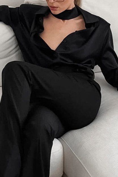 Blusas sexis de color liso con botones y cuello vuelto