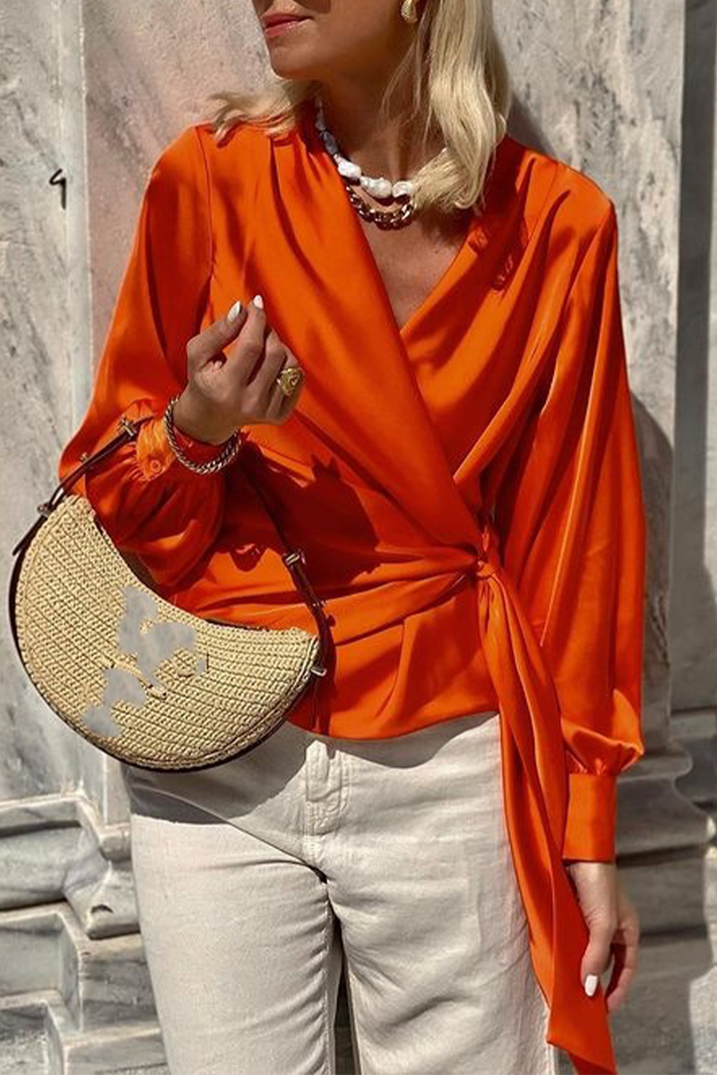 Elegantes blusas de color sólido con cordones y cuello en V
