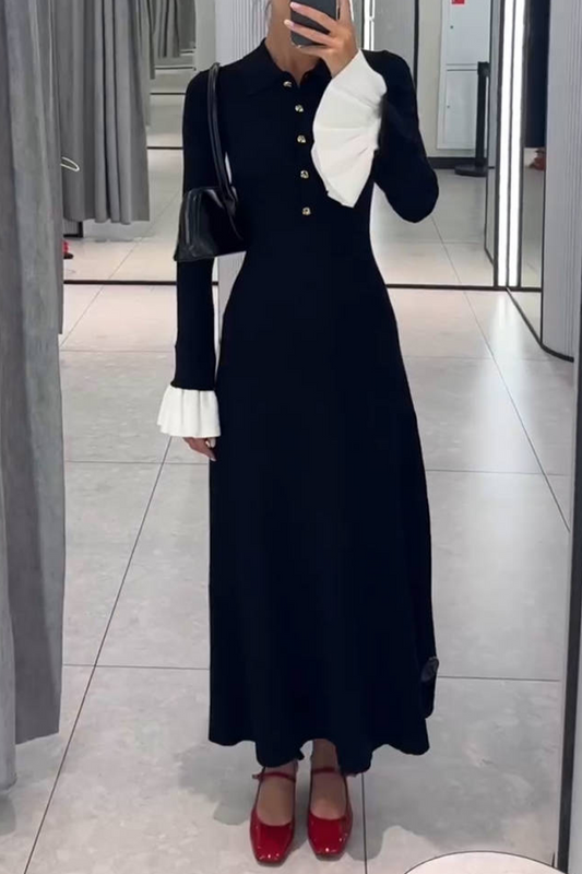 Elegante vestido de falda con escote redondo y cintura alta con volantes en contraste