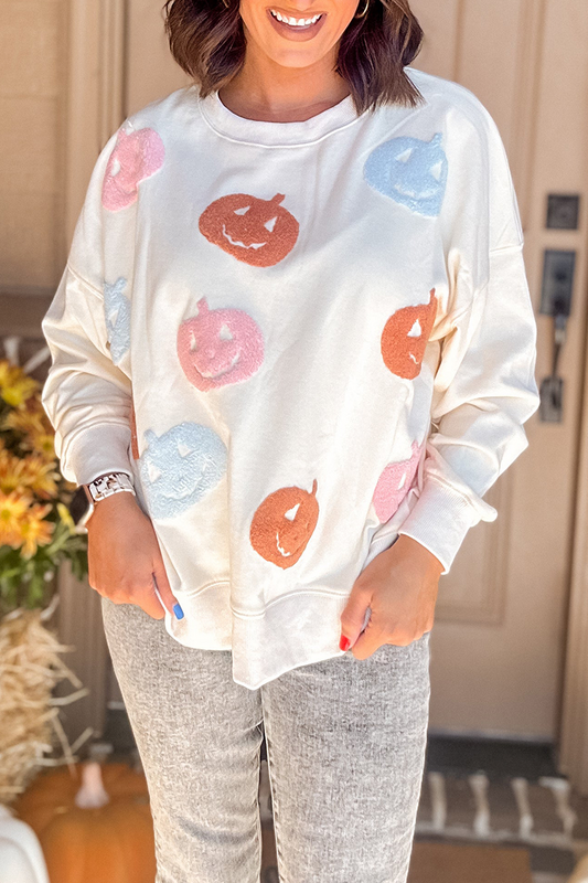 Sudadera informal con cuello redondo y parche de calabaza