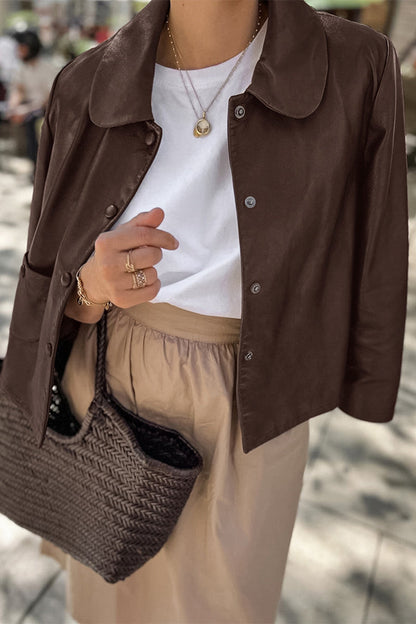 Prendas de abrigo con cuello vuelto, botones y bolsillos de color liso