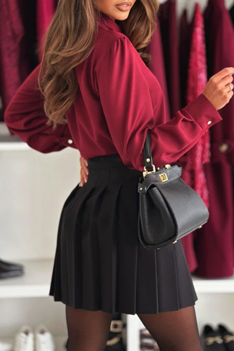 Blusa elegante con botones calados y cuello vuelto (3 colores)