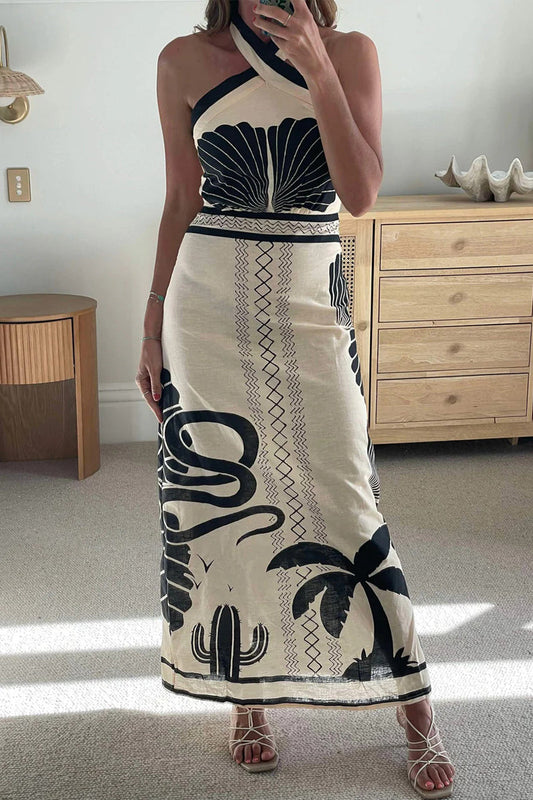 Vestidos sexys de vacaciones con estampado floral en contraste, falda de un solo paso y cuello halter