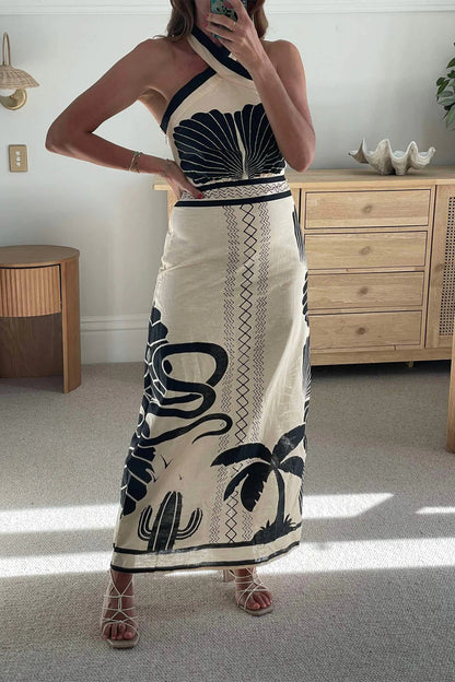 Vestidos sexys de vacaciones con estampado floral en contraste, falda de un solo paso y cuello halter