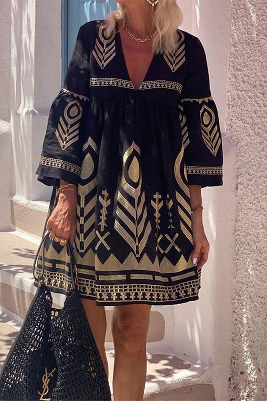 Vestidos casuales con estampado geométrico, volantes y cuello en V