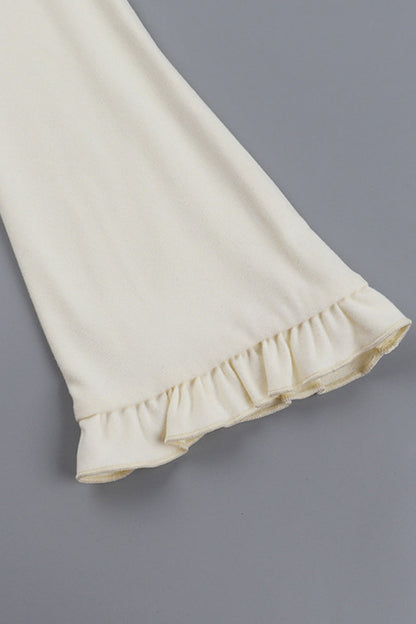 Blusa informal con cuello en V, aberturas y cordones con orillo fibroso