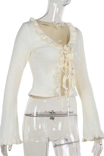 Blusa informal con cuello en V, aberturas y cordones con orillo fibroso