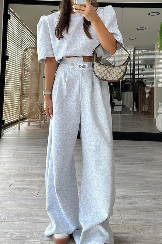 Conjunto informal de dos piezas con bolsillo, cuello redondo y manga corta