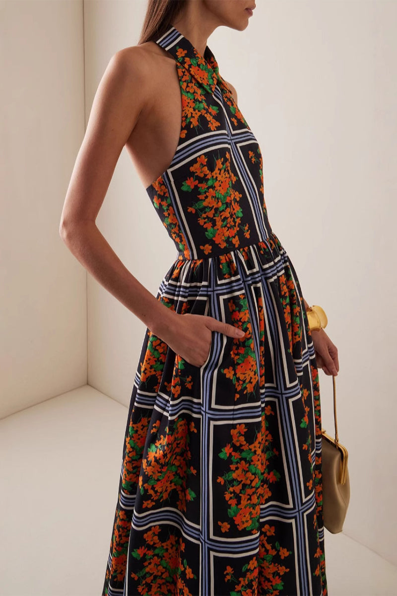 Elegante vestido de falda de un solo paso con halter y contraste con estampado floral