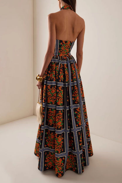 Elegante vestido de falda de un solo paso con halter y contraste con estampado floral