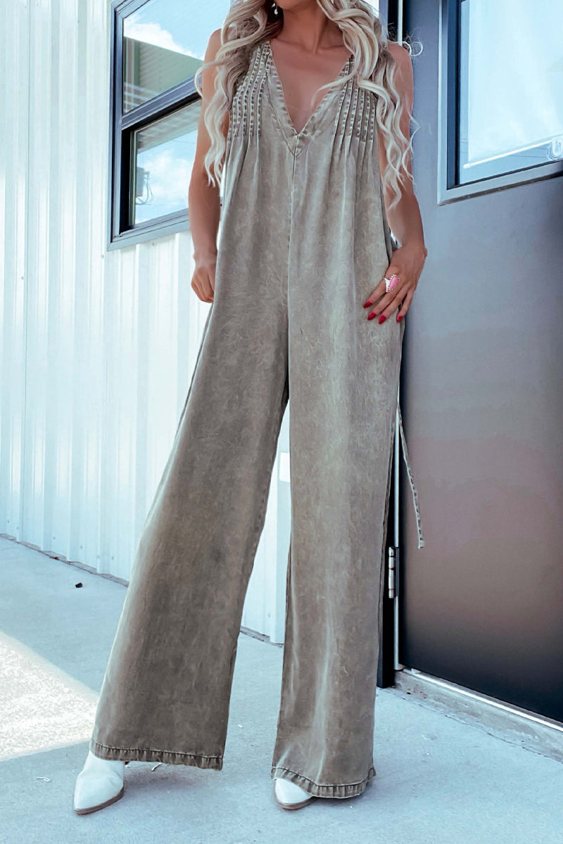 Mono holgado informal con cuello en V ajustable y bolsillo desgastado