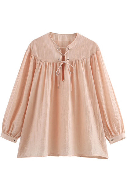 Blusas casuales de color sólido con cordones y cuello redondo