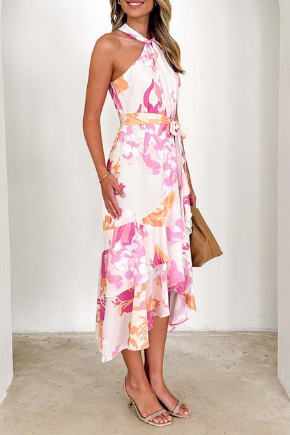Elegante vestido irregular con volantes, cuello halter y estampado floral