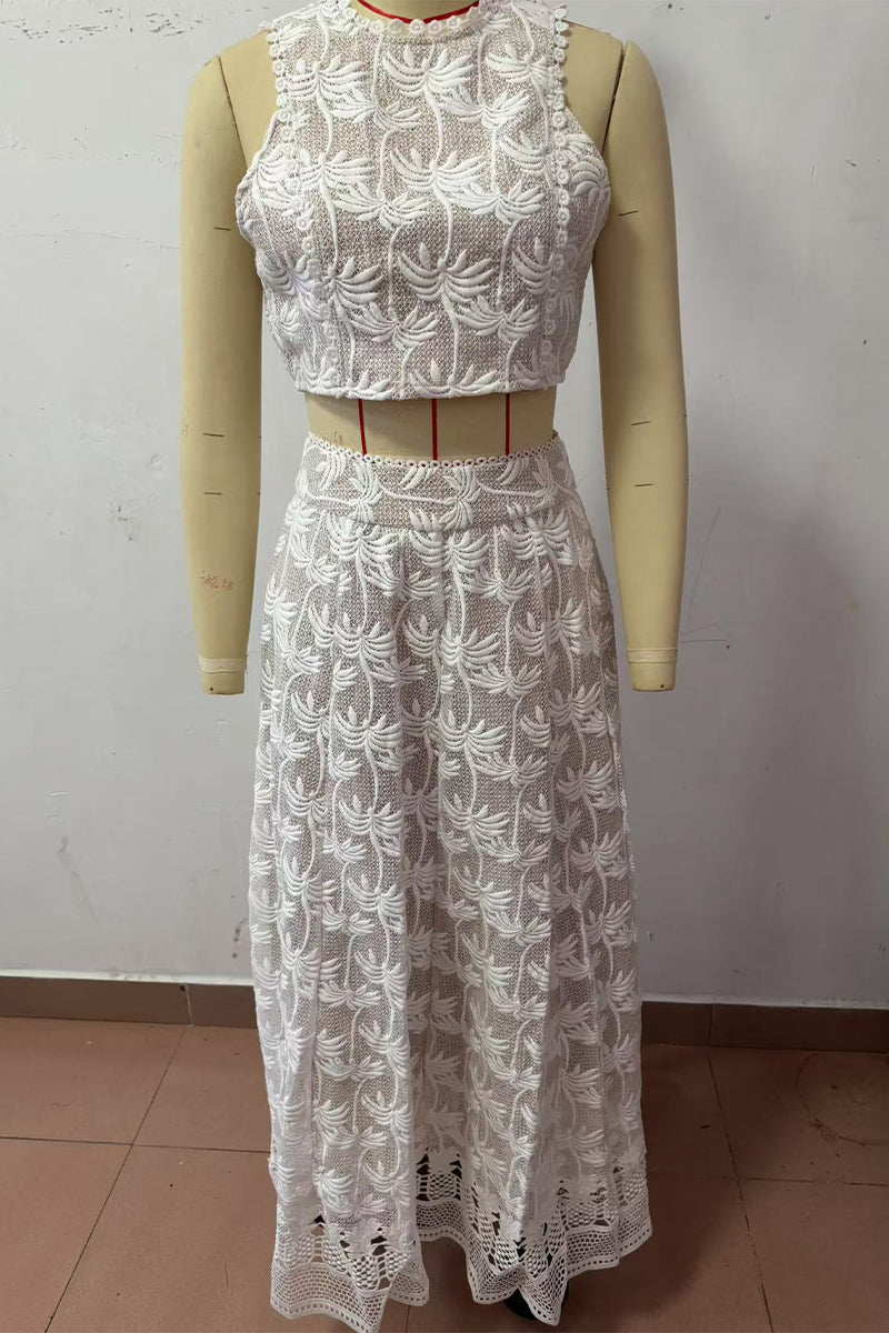 Conjunto informal de dos piezas con flores bordadas, bolsillo, cremallera y cuello redondo, sin mangas