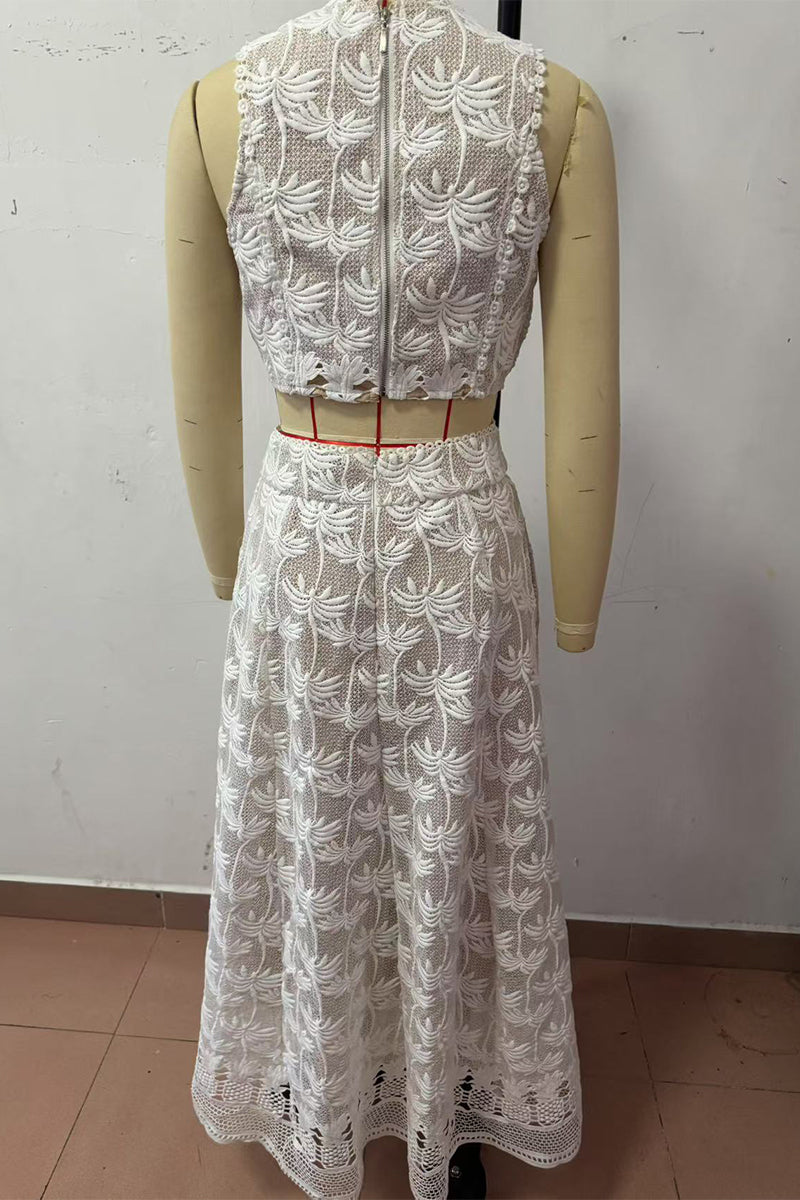 Conjunto informal de dos piezas con flores bordadas, bolsillo, cremallera y cuello redondo, sin mangas