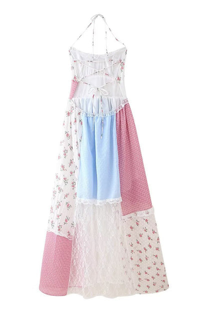 Elegante vestido largo con cuello halter, espalda descubierta, encaje y cordón ajustable con estampado floral