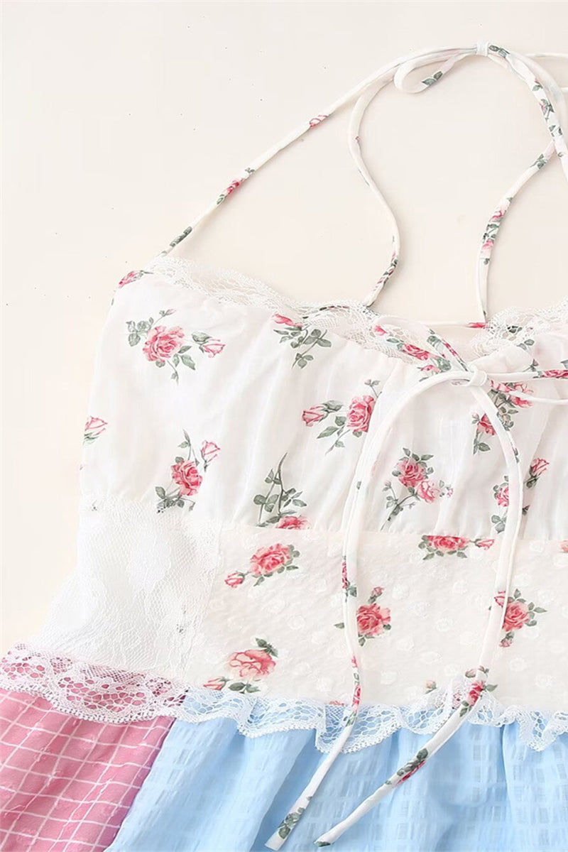 Elegante vestido largo con cuello halter, espalda descubierta, encaje y cordón ajustable con estampado floral