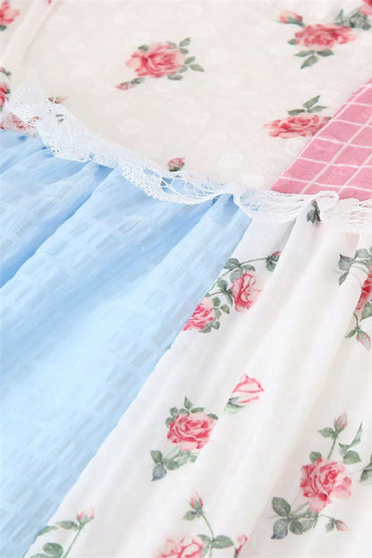 Elegante vestido largo con cuello halter, espalda descubierta, encaje y cordón ajustable con estampado floral
