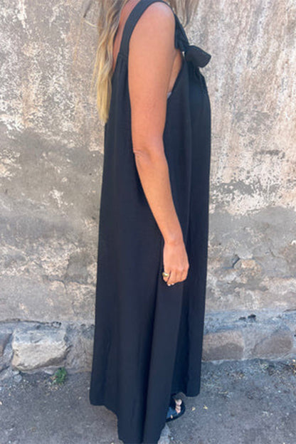 Vestidos casuales de tirantes con cuello en U y flores en color liso