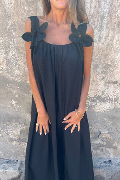 Vestidos casuales de tirantes con cuello en U y flores en color liso