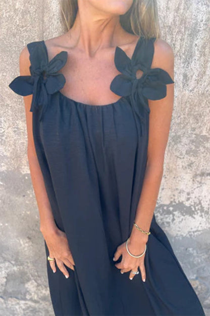 Vestidos casuales de tirantes con cuello en U y flores en color liso