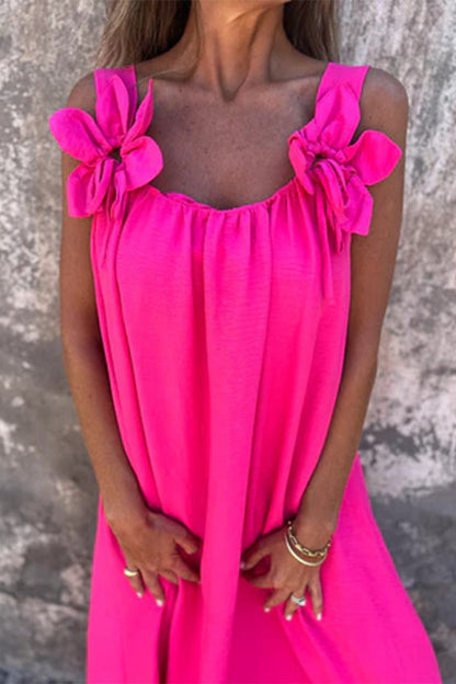 Vestidos casuales de tirantes con cuello en U y flores en color liso