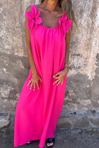 Vestidos casuales de tirantes con cuello en U y flores en color liso