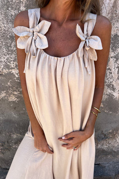 Vestidos casuales de tirantes con cuello en U y flores en color liso