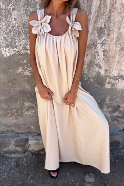 Vestidos casuales de tirantes con cuello en U y flores en color liso