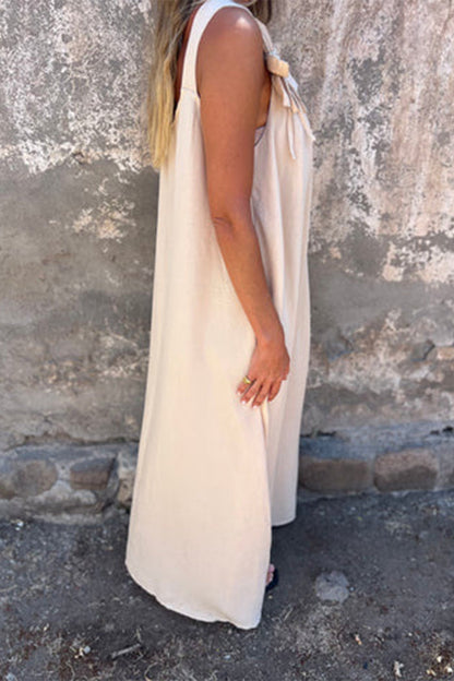 Vestidos casuales de tirantes con cuello en U y flores en color liso