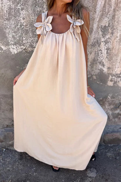 Vestidos casuales de tirantes con cuello en U y flores en color liso