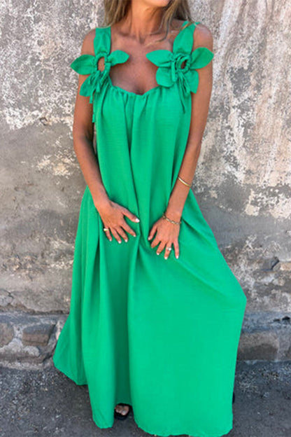 Vestidos casuales de tirantes con cuello en U y flores en color liso