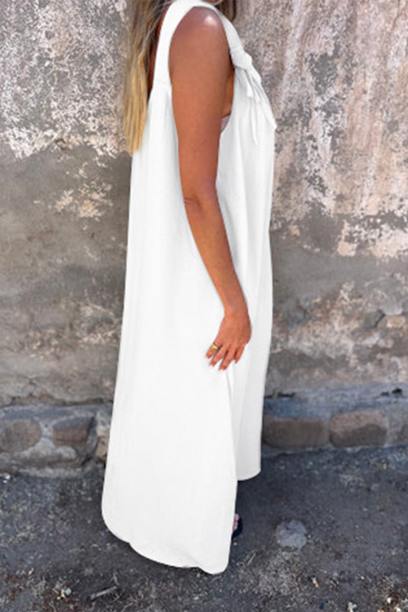Vestidos casuales de tirantes con cuello en U y flores en color liso