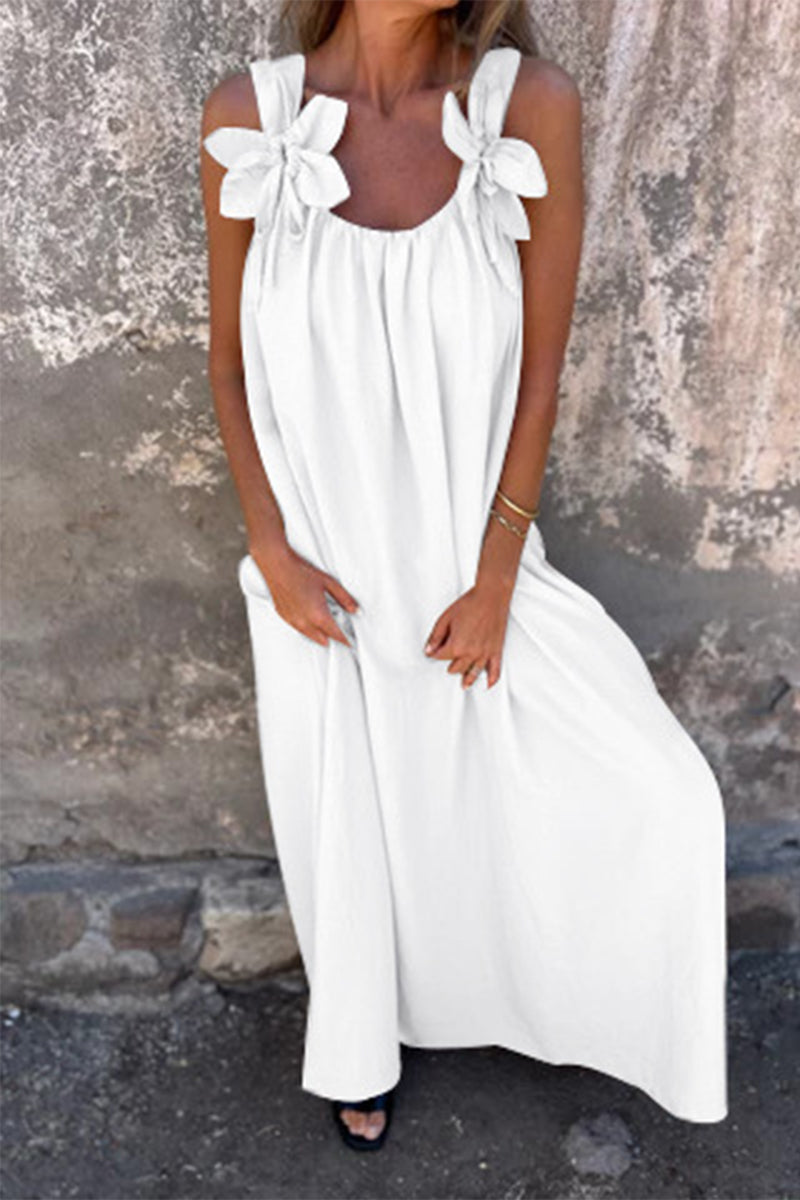 Vestidos casuales de tirantes con cuello en U y flores en color liso