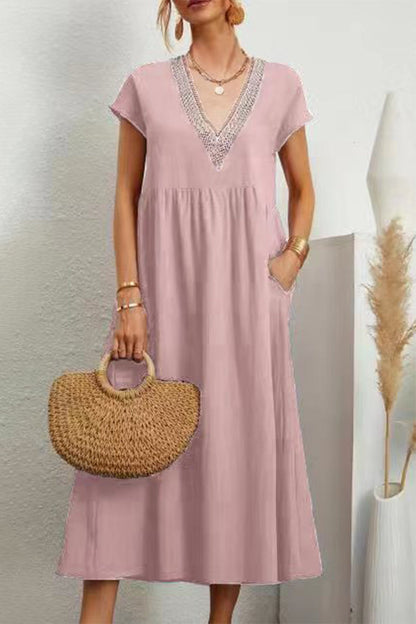 Vestido informal de color liso con bolsillos, escote en V y manga corta