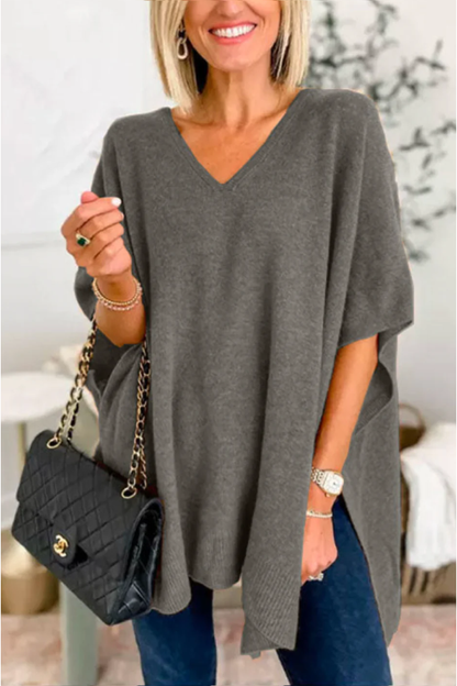 Suéter tipo poncho holgado de color liso con cuello en V