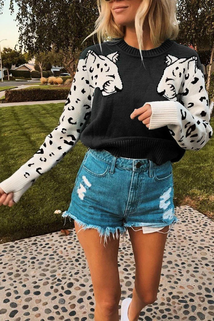 Suéter de punto con diseño de leopardo de las nieves