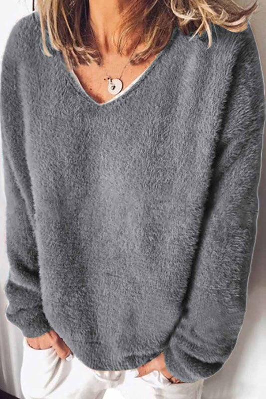 Top holgado de color liso con cuello en V