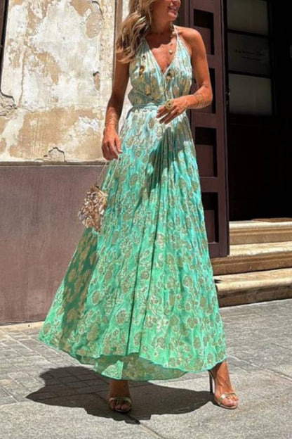 Vestido largo Bianca con cuello halter, corte A y estampado floral dorado degradado con efecto tie-dye